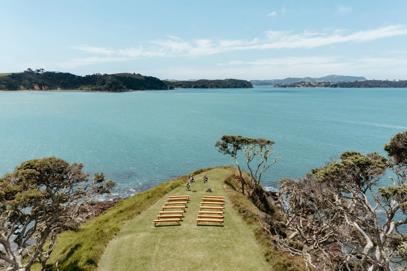 A clifftop wedding ceremony overlooking the sea in the Bay of Islands, Northland